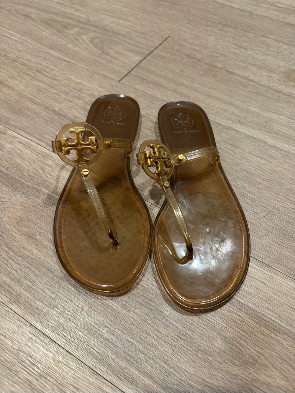 Tory Burch Transparent Brown Jelly Thong Sandals with Gold Logo